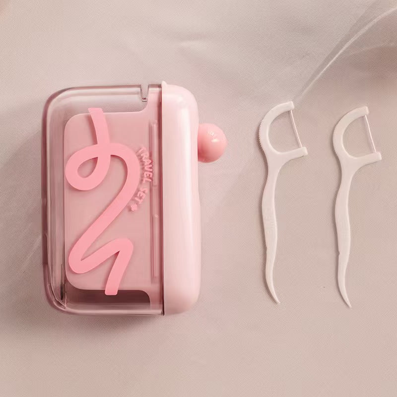 🦷🔄Travel-sized storage case - features an automatic pop-up dispenser